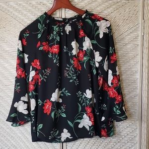 Black blouse with red and white flowers